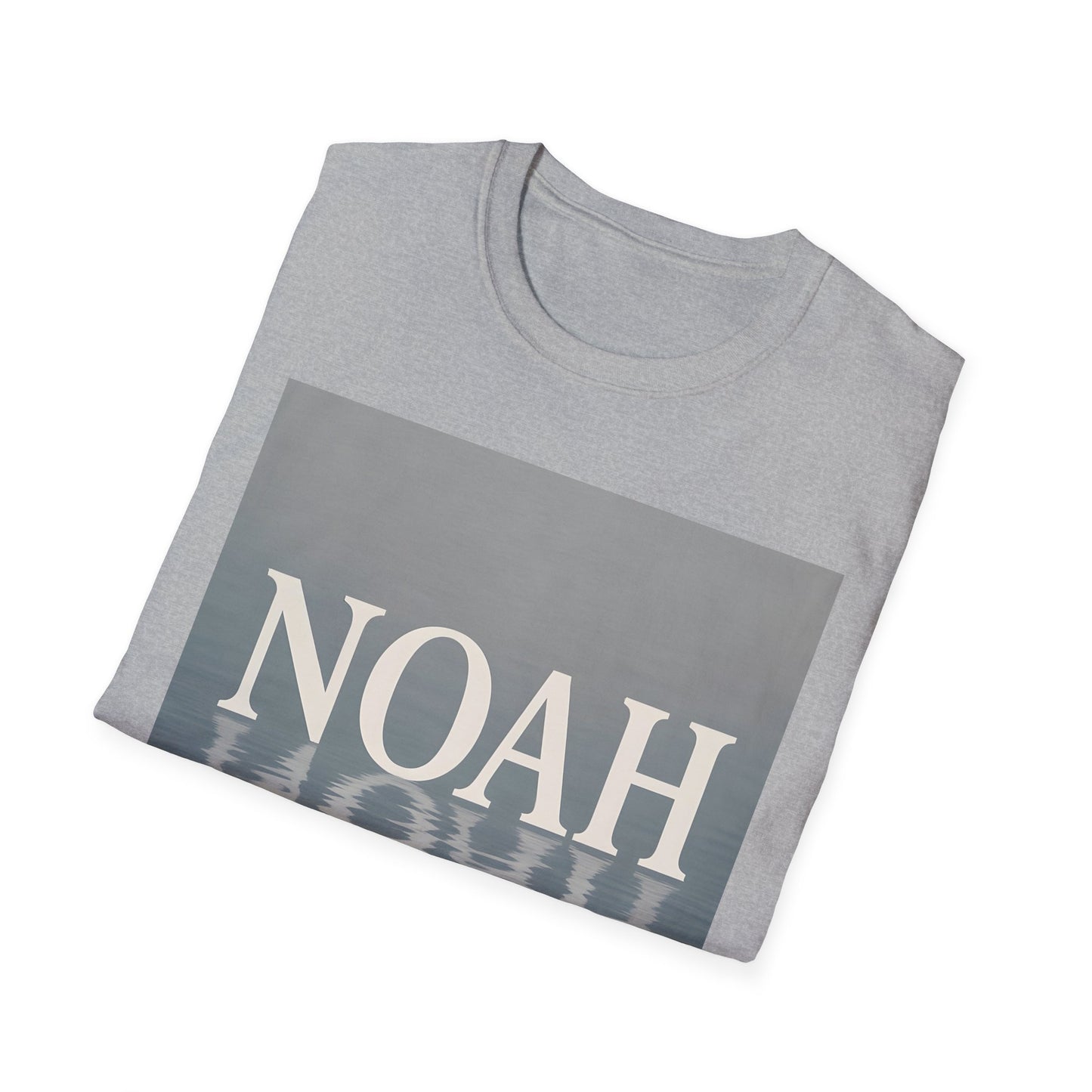 Light gray folded T-shirt with a blue-gray rectangle graphic showing the word NOAH and a water-reflection pattern.