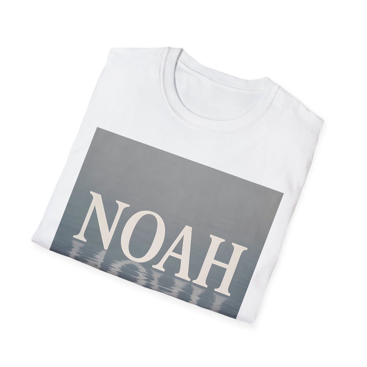 White T-shirt folded, front features a gray-blue rectangle with the word NOAH in large white letters and a water reflection at the bottom.