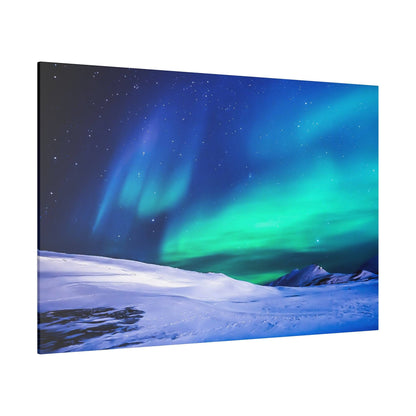 Canvas print of a snowy Arctic landscape at night with green and blue aurora borealis across the sky.