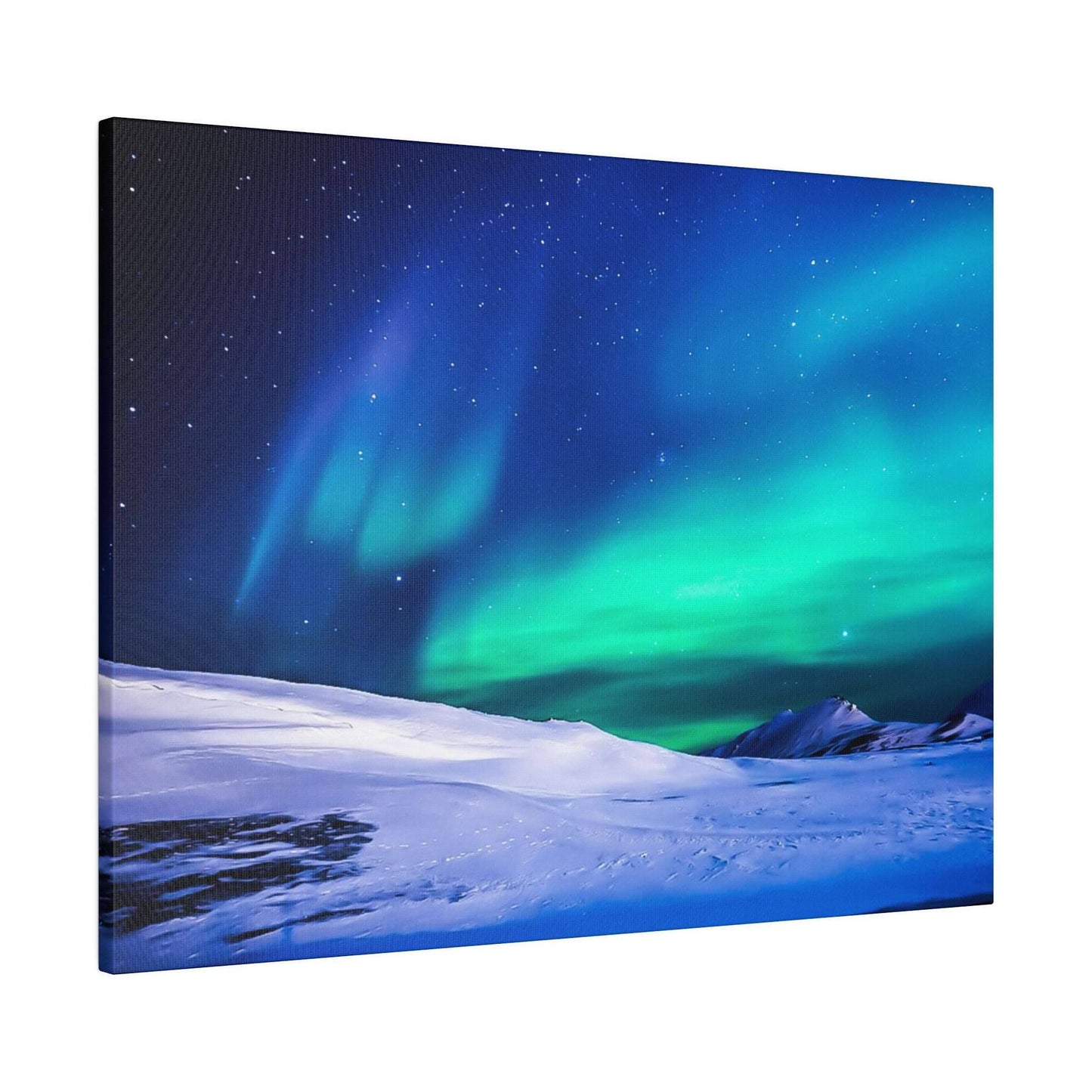 Canvas print showing green and blue aurora borealis across a starry night sky over a snow-covered landscape.