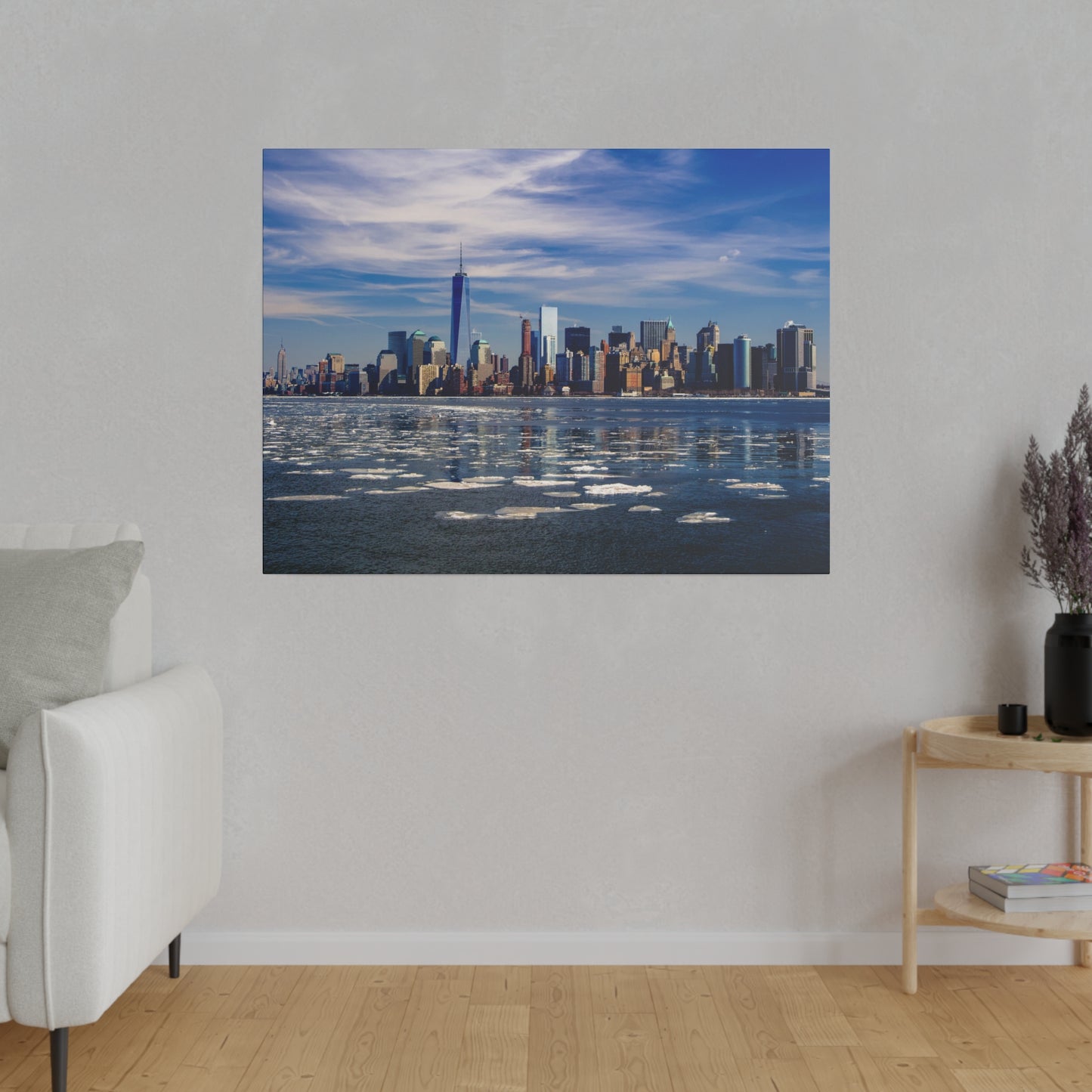 New York City skyline reflecting beautifully on the river water, with a clear and vibrant blue sky.