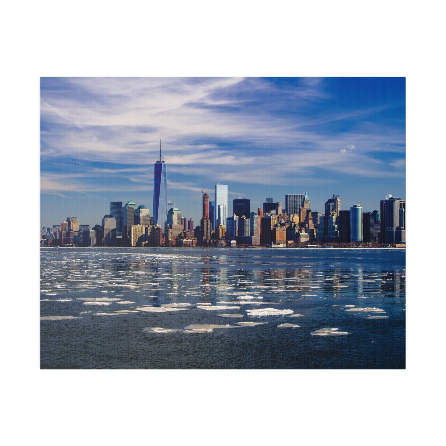 Panoramic shot of the NYC skyline from the waterfront, with prominent skyscrapers and a tranquil river scene.