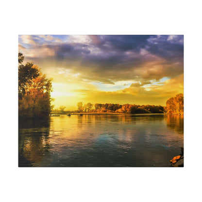 Golden sunset over a calm river with orange trees along the banks, reflecting in the water.