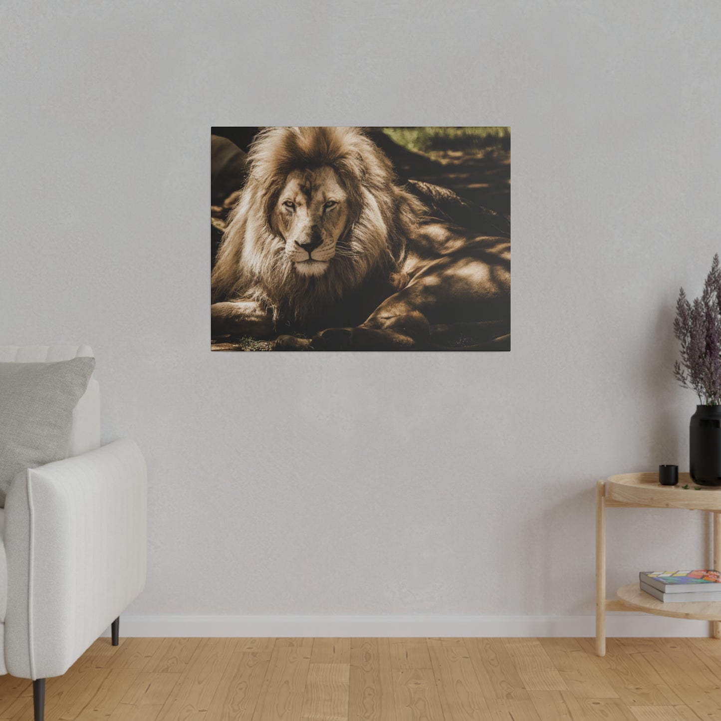 A powerful lion resting peacefully in the shade, its impressive mane and tranquil expression on full display.