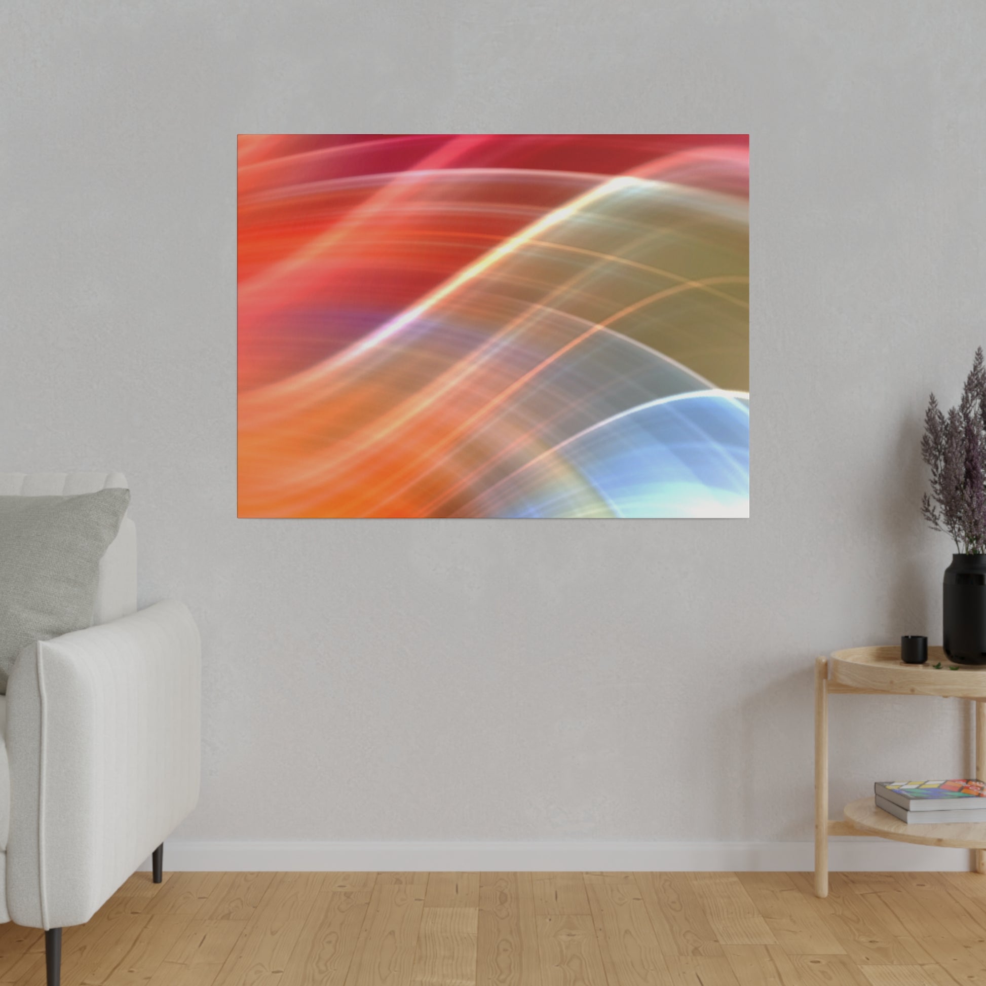 Abstract multicolor artwork with curved light streaks in red, orange, blue hangs on a gray wall in a living room.