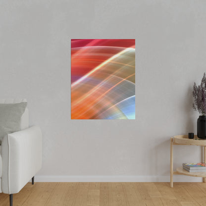 Vertical poster on a light gray wall features diagonal, multicolored light streaks in red, orange, and blue.