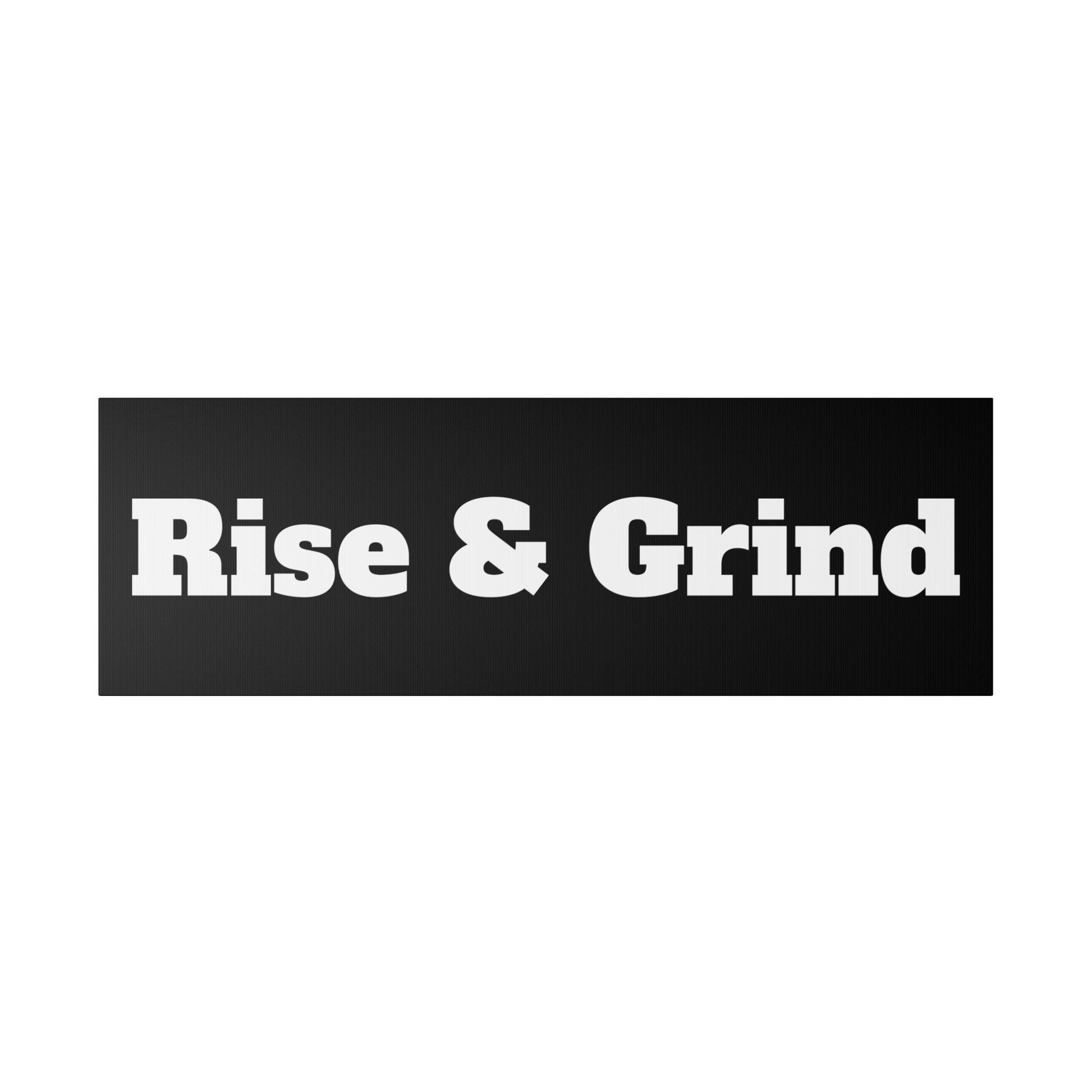 A black rectangular sticker with bold white text reading 'Rise & Grind'.