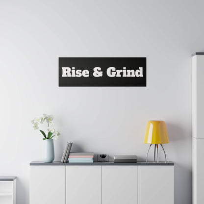 White cabinet against a light wall with a yellow lamp and a black sign reading "Rise & Grind.