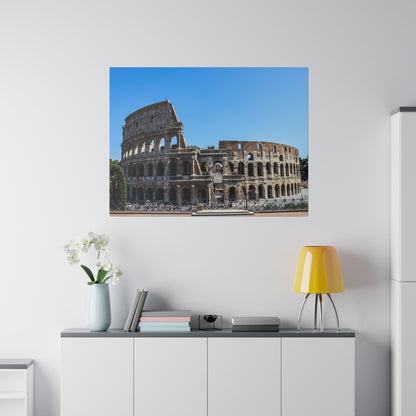 Photo of the Roman Colosseum with arches, mounted on a white wall in a modern living room.