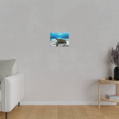 Small square wall art depicting a sea turtle swimming underwater over a sandy seabed.
