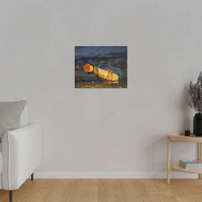 A framed painting of a yellow bottle lying on the sandy beach hangs on a light gray living-room wall.