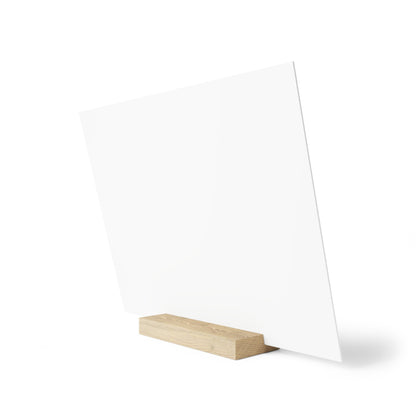 White angled display panel mounted on a light wooden rectangular base.