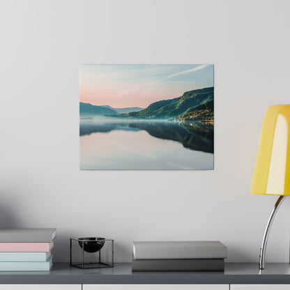 Canvas wall art of a tranquil lake with green mountains and pastel sky reflecting in the water.