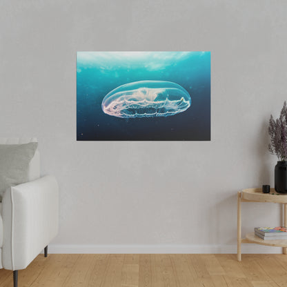 Canvas wall art showing a translucent jellyfish drifting in turquoise ocean water.