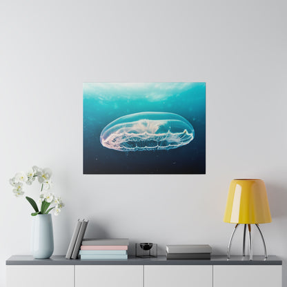 A wall-mounted print of a translucent jellyfish in turquoise water, centered above a white sideboard with a yellow lamp.