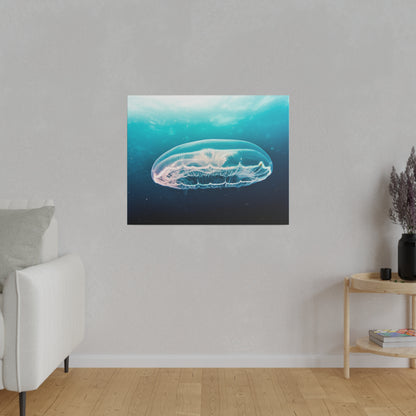 Square wall art of a glowing blue jellyfish underwater against a gradient blue background.