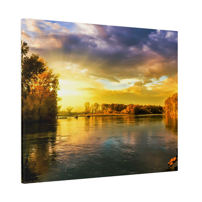 Golden sunset over a calm river with orange trees along the banks and their reflections in the water.
