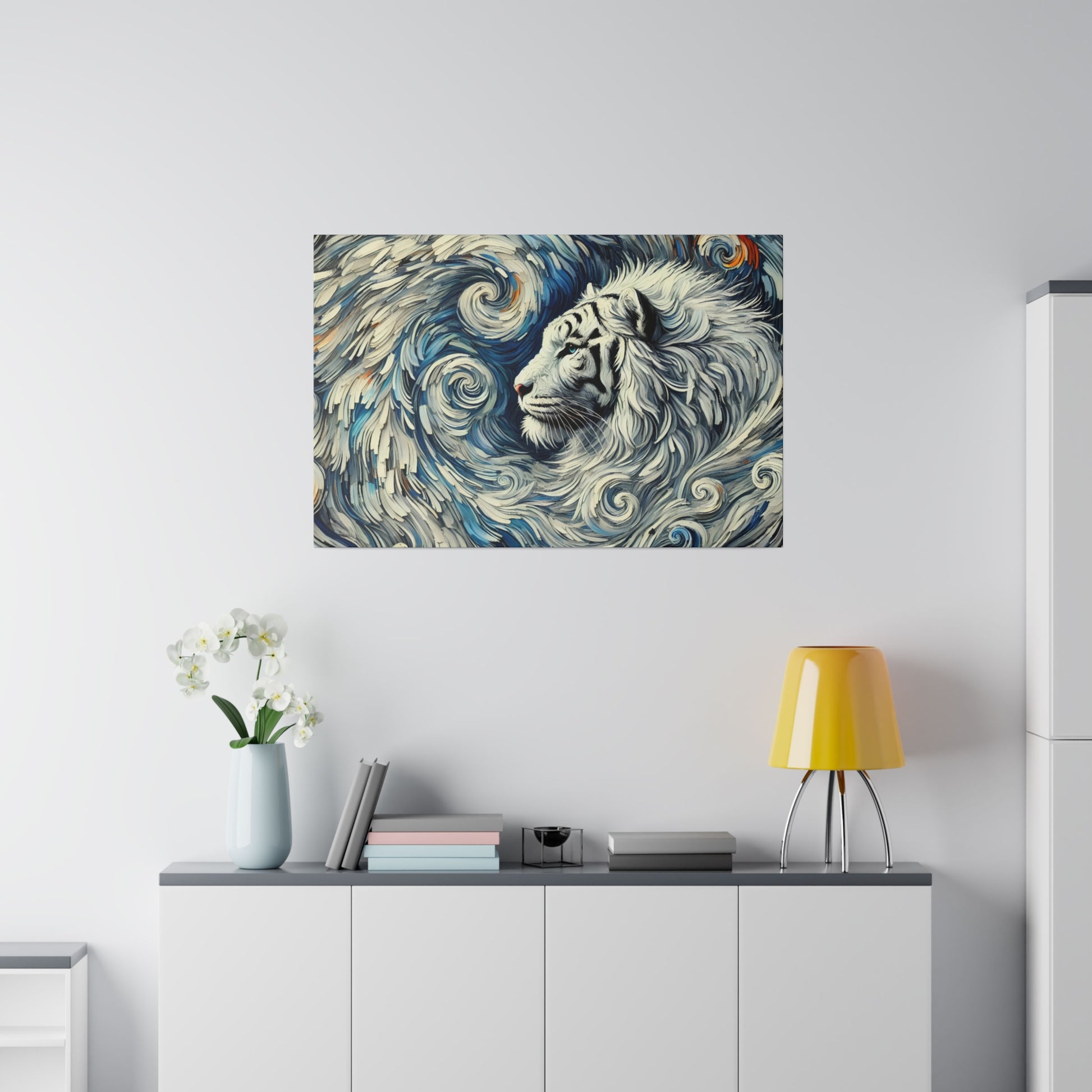 Painting of a white tiger with blue swirls on a white wall above a cabinet with a yellow lamp, books, and a vase of white orchids.
