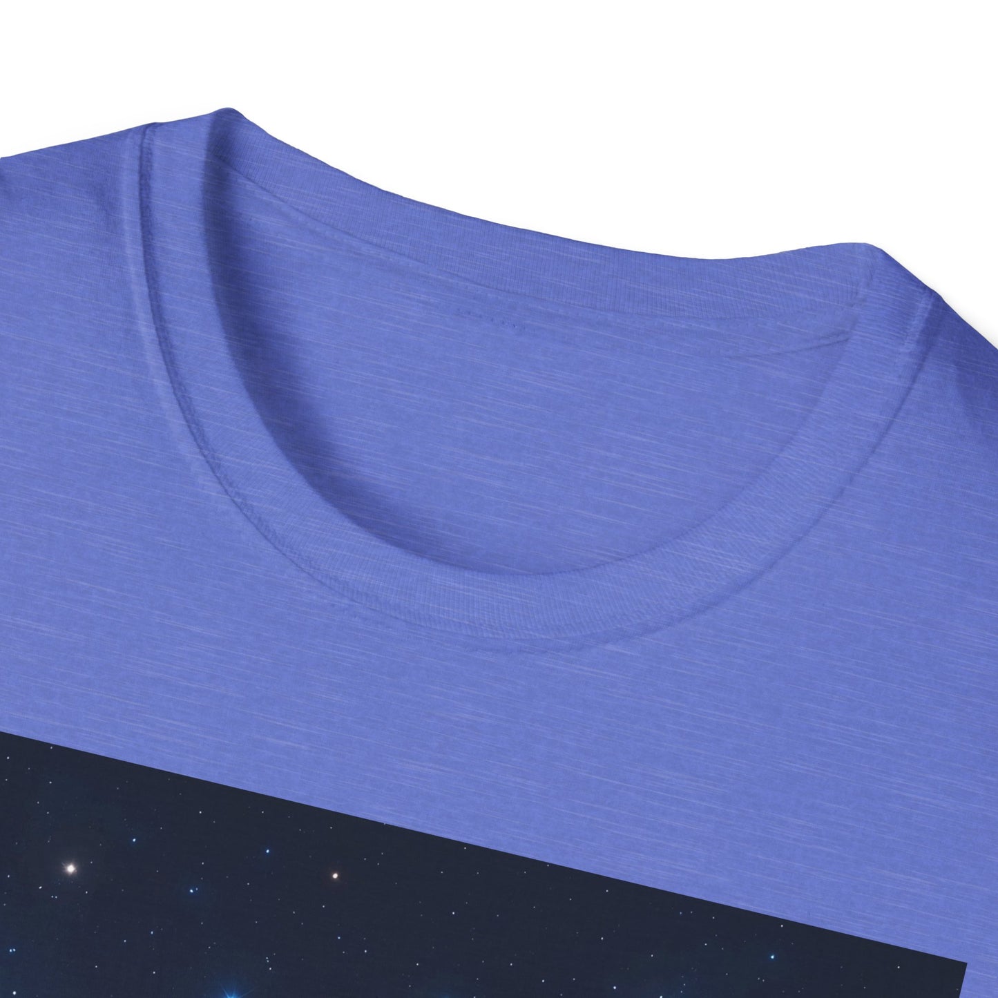 Close-up of a light blue T-shirt with a round neckline and a dark starry panel at the bottom.