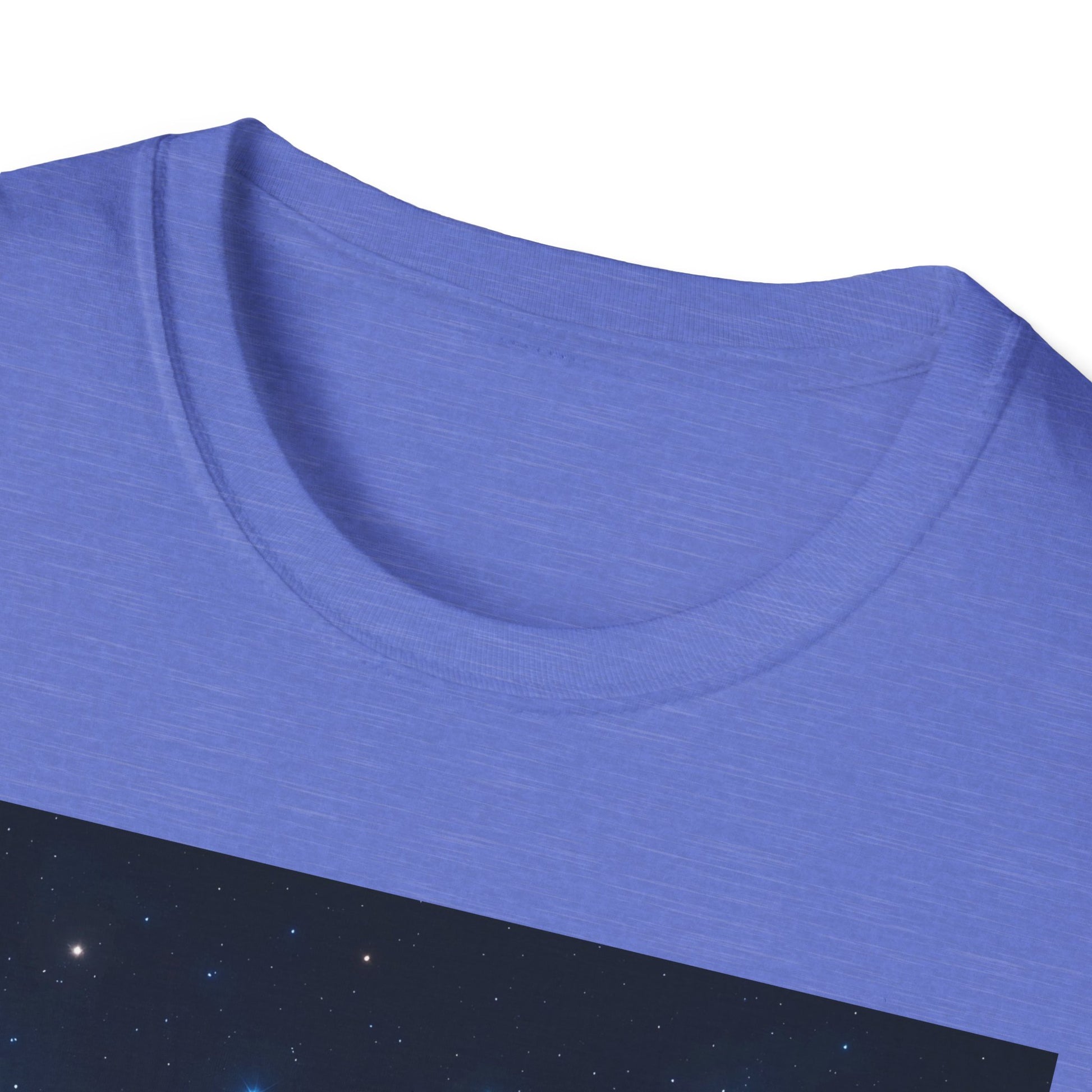 Close-up of a light blue T-shirt with a round neckline and a dark starry panel at the bottom.