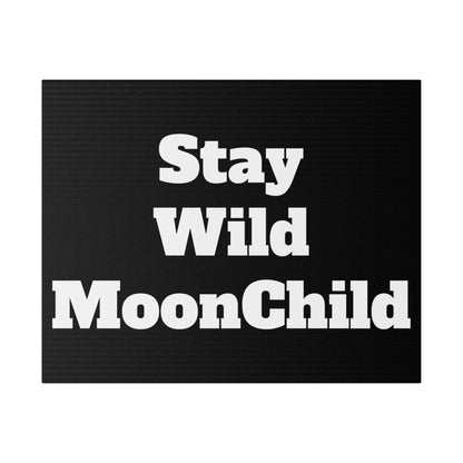 Black rectangular doormat with white bold lettering reading "Stay Wild MoonChild".