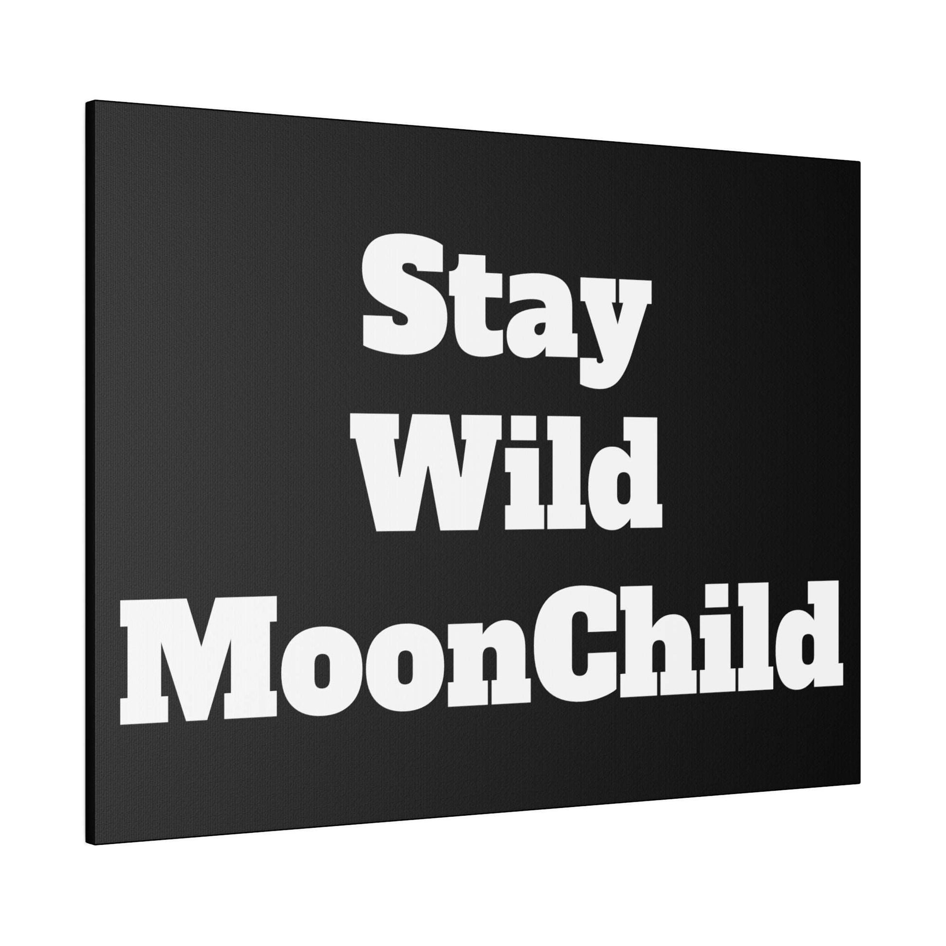 Black canvas wall art with bold white text reading “Stay Wild MoonChild” in large font.