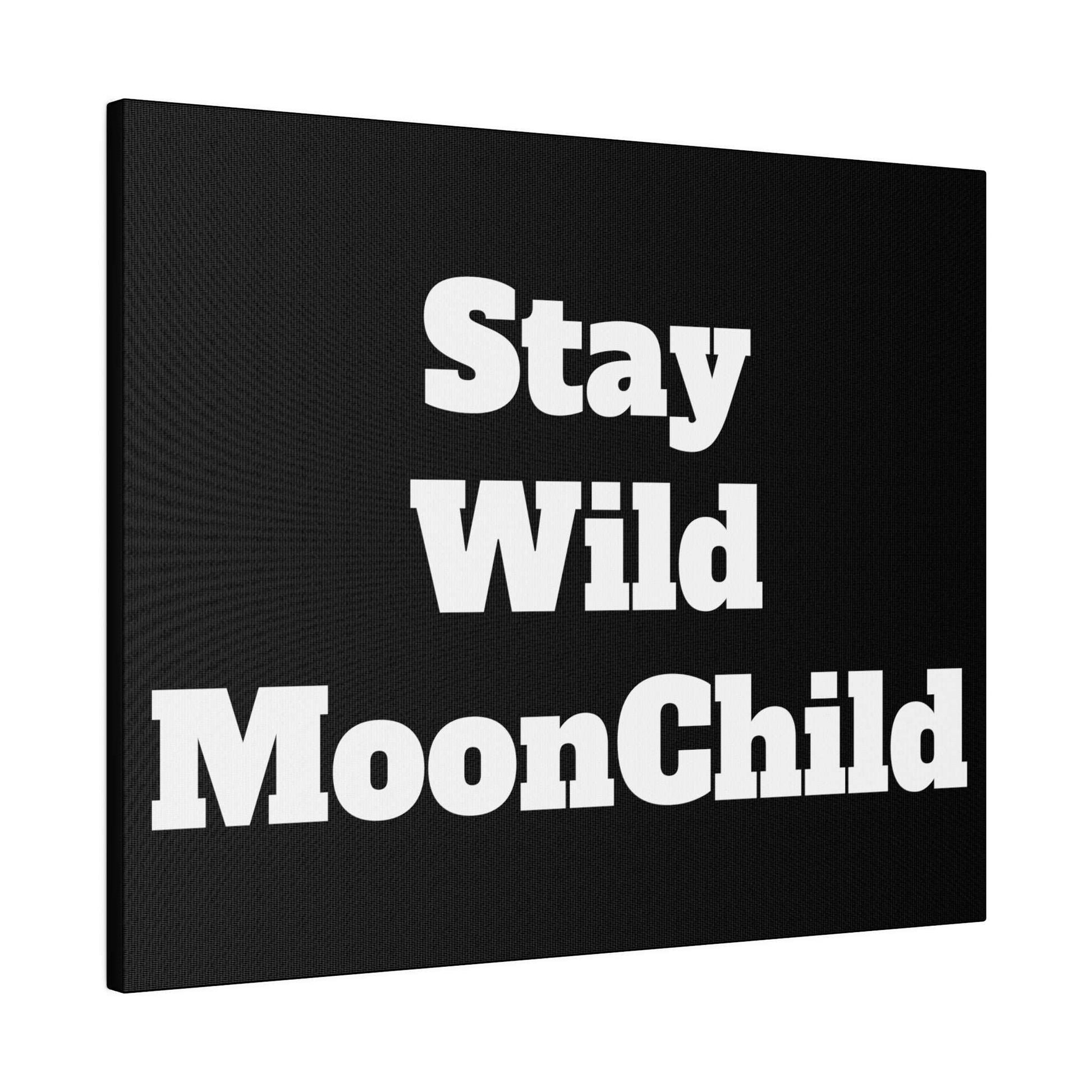 Black canvas wall art with large white bold text reading “Stay Wild MoonChild.”