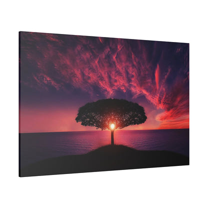 Silhouette of a lone tree on a small hill overlooking a calm sea at sunset, with a red-purple sky.