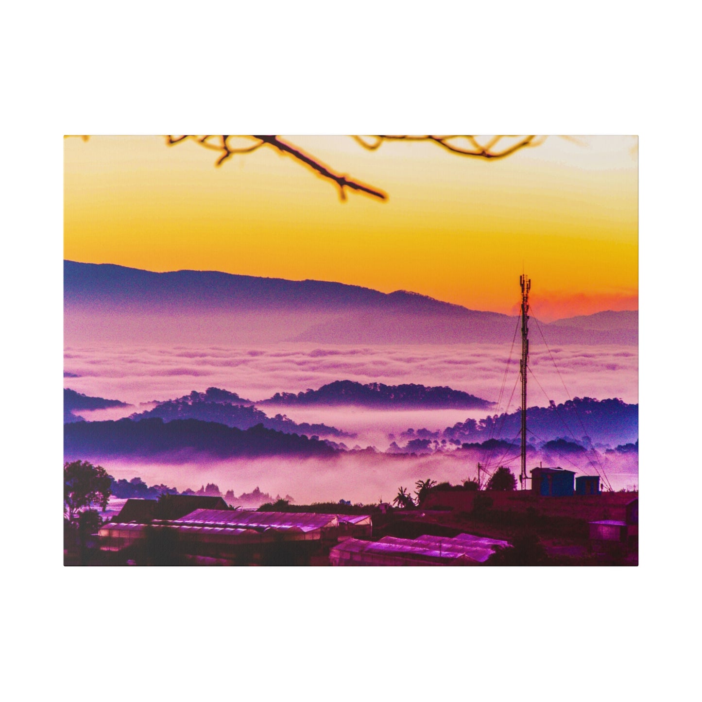 Stunning views of the mountains at sunrise, with the sky ablaze in vibrant colors and mist rolling through the valleys below.