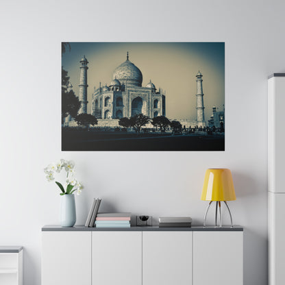 Colorized photograph of the Taj Mahal with its dome and two minarets, hung on a white wall above a cabinet.