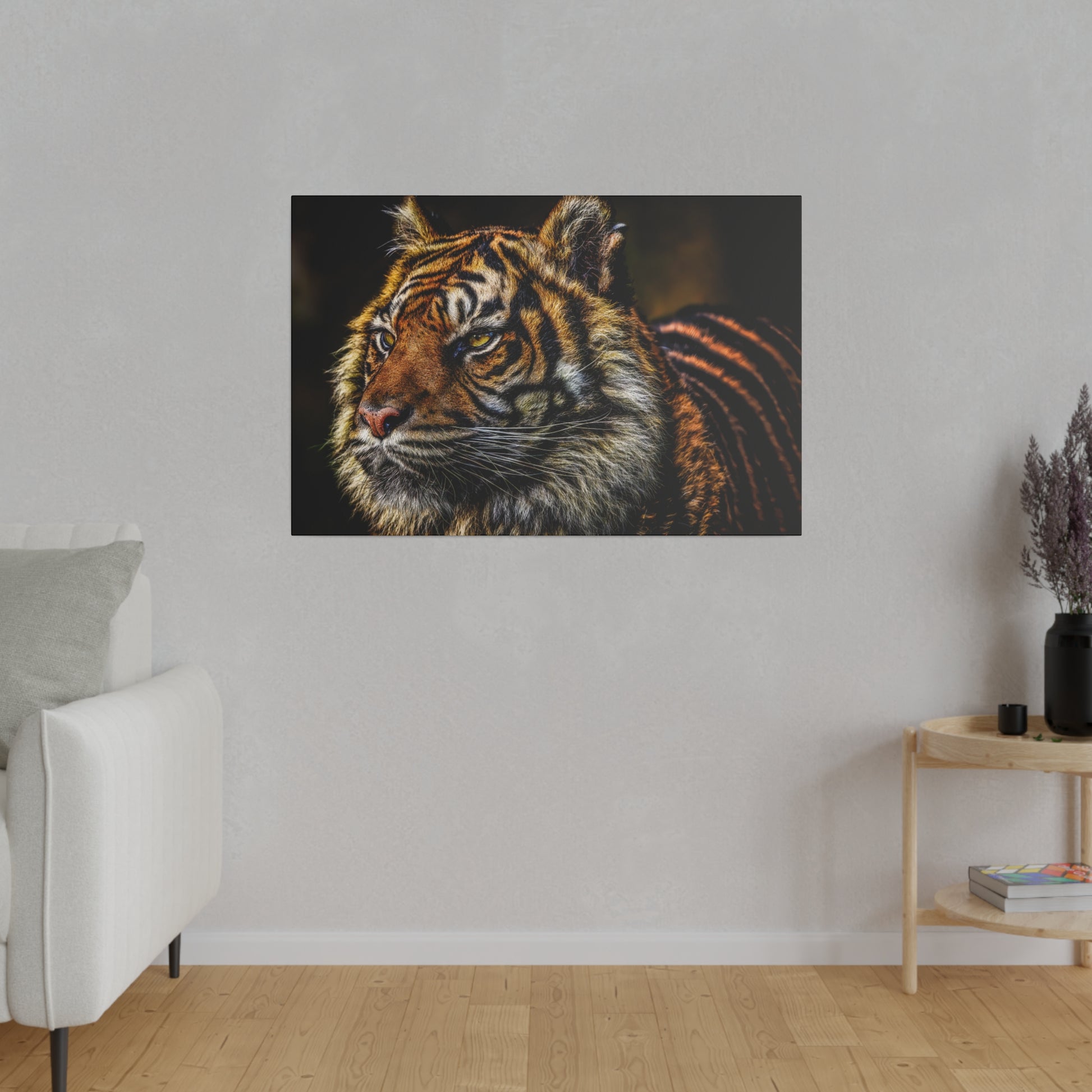 An intense gaze from a tiger captured in a close-up view. The detailed portrait emphasizes the depth in the tiger's eyes and the intricate patterns of its fur.