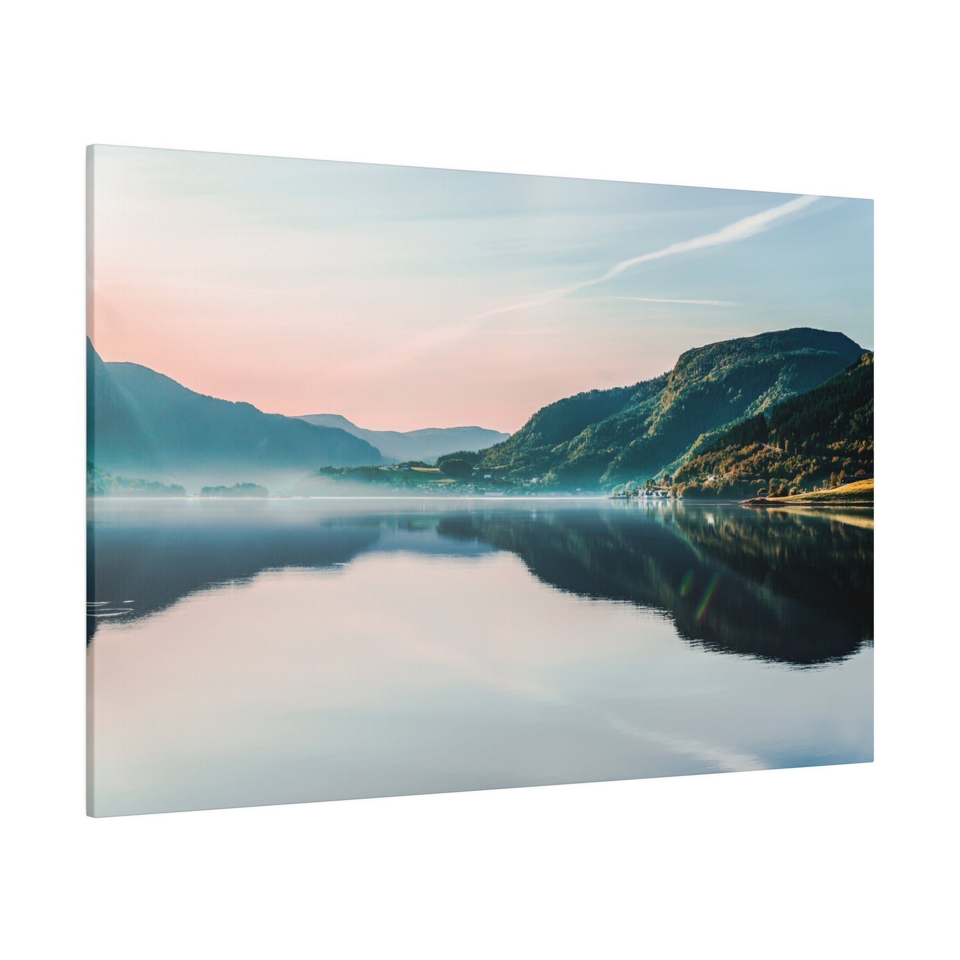 Canvas wall art showing a tranquil lake with surrounding mountains, pastel pink-blue sky, and a mirrored reflection on the water.
