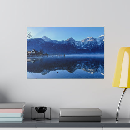 Framed wall art of a blue alpine lake with snow‑capped mountains and a dock reflected in the calm water.