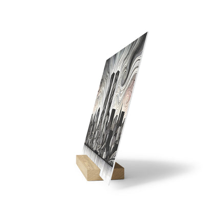 Diagonal print on white board with black and gray swirling abstract pattern, mounted on a small wooden stand.