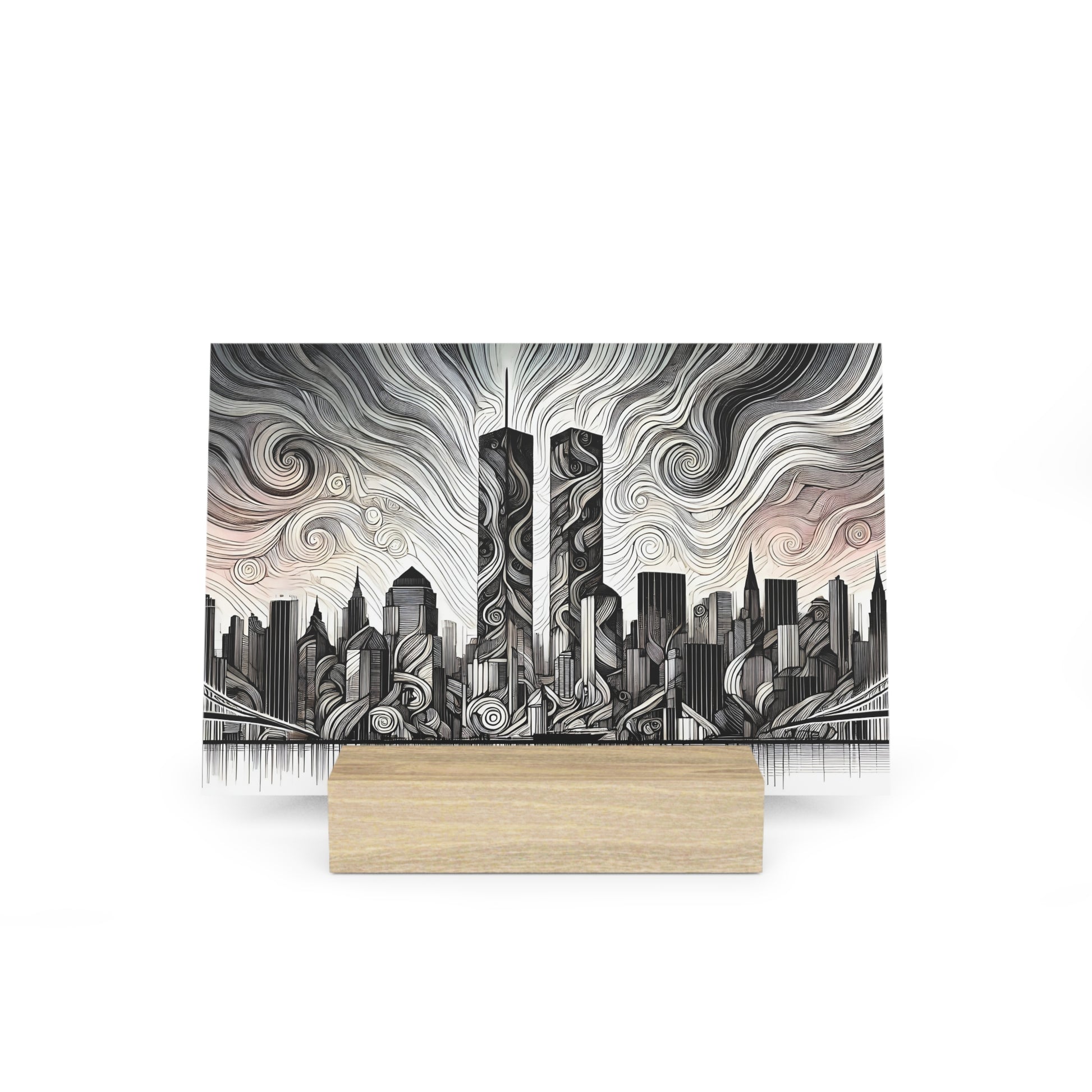 Black-and-white urban skyline print with swirling line patterns, featuring two tall central skyscrapers, mounted on a light wood block.