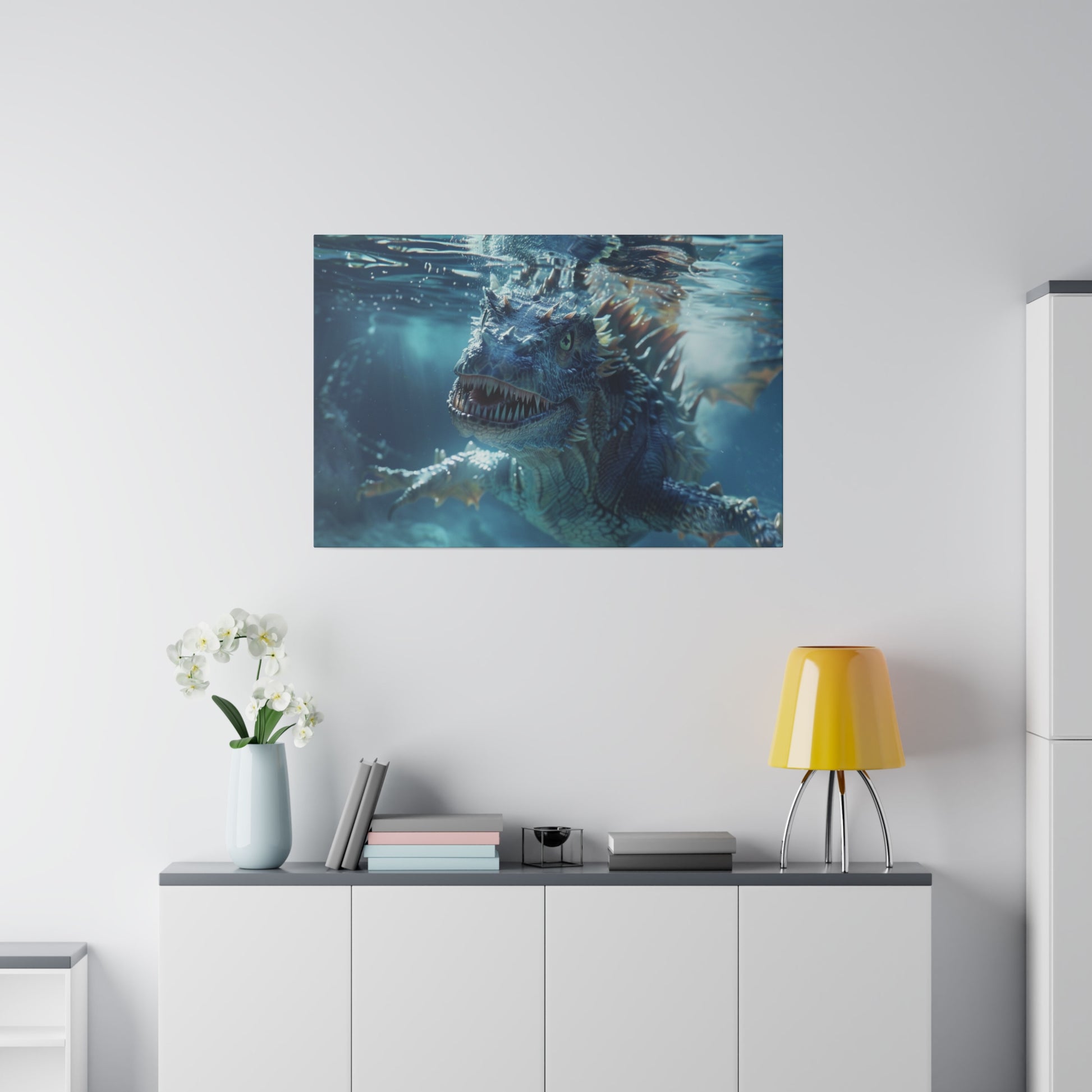 Underwater blue dragon poster mounted on a white wall above a white cabinet with a yellow table lamp.