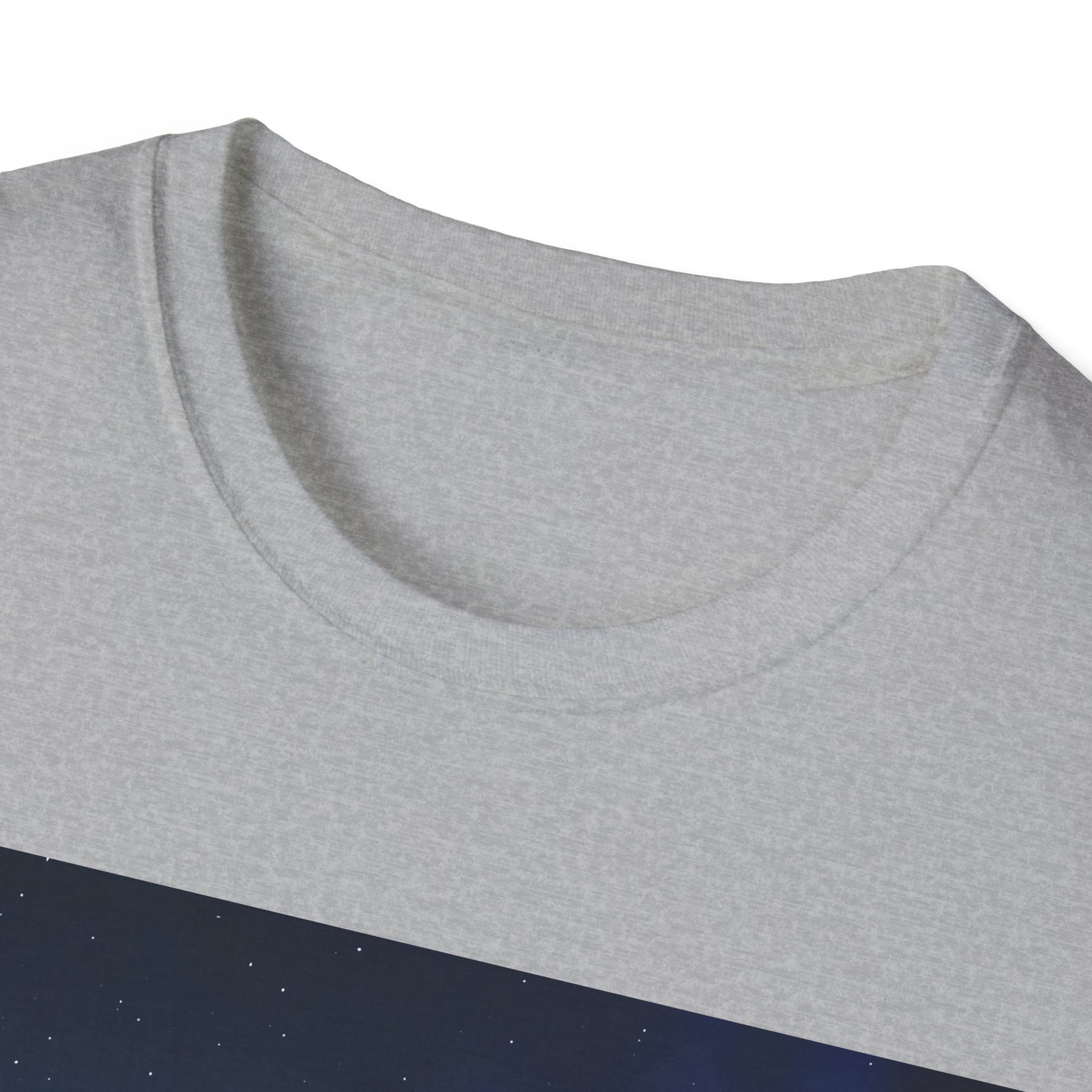 Close-up of a light gray heathered crewneck T-shirt with a dark blue panel featuring small white specks along the bottom edge.