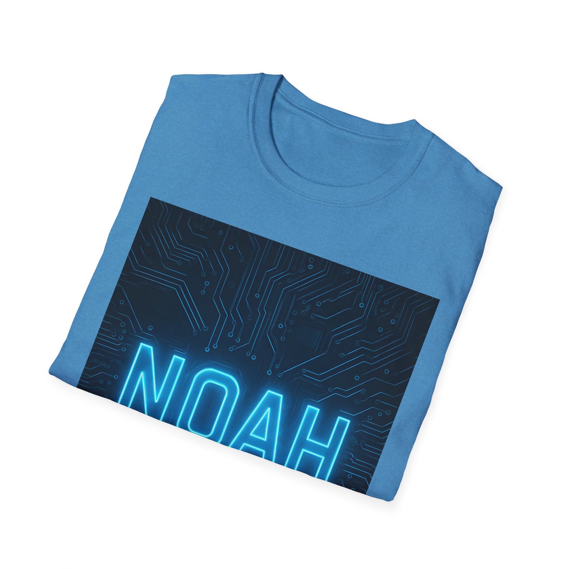 Blue crewneck t-shirt folded, featuring a dark rectangular circuit-board graphic and bright neon blue “NOAH” text.