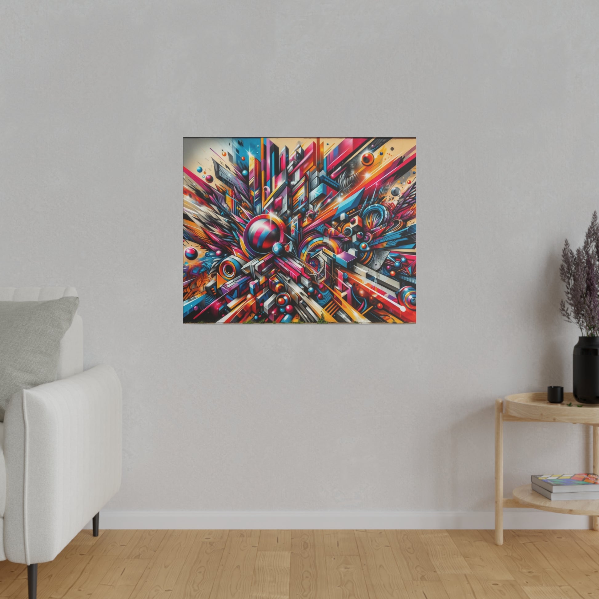 Abstract geometric painting with bright red, blue, and yellow shapes mounted on a light gray wall above a wooden floor in a living room.