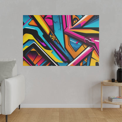 Abstract graffiti-style geometric painting in bright pink, yellow, blue on a gray wall above a wooden floor.