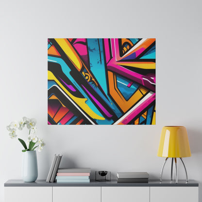 Abstract graffiti-style painting with bold yellow, pink, blue, and orange shapes hung on a white wall above a gray console.