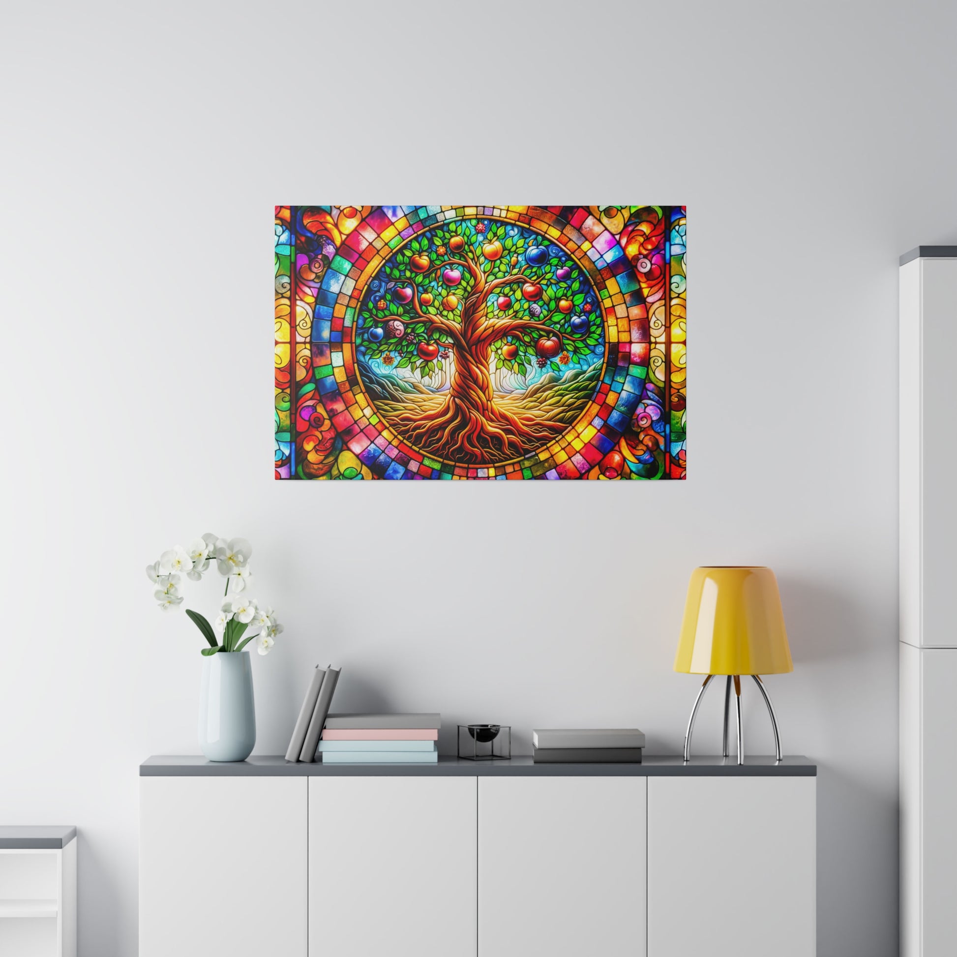 Colorful stained-glass style artwork of a vibrant tree with a multicolored circular border on a white wall.
