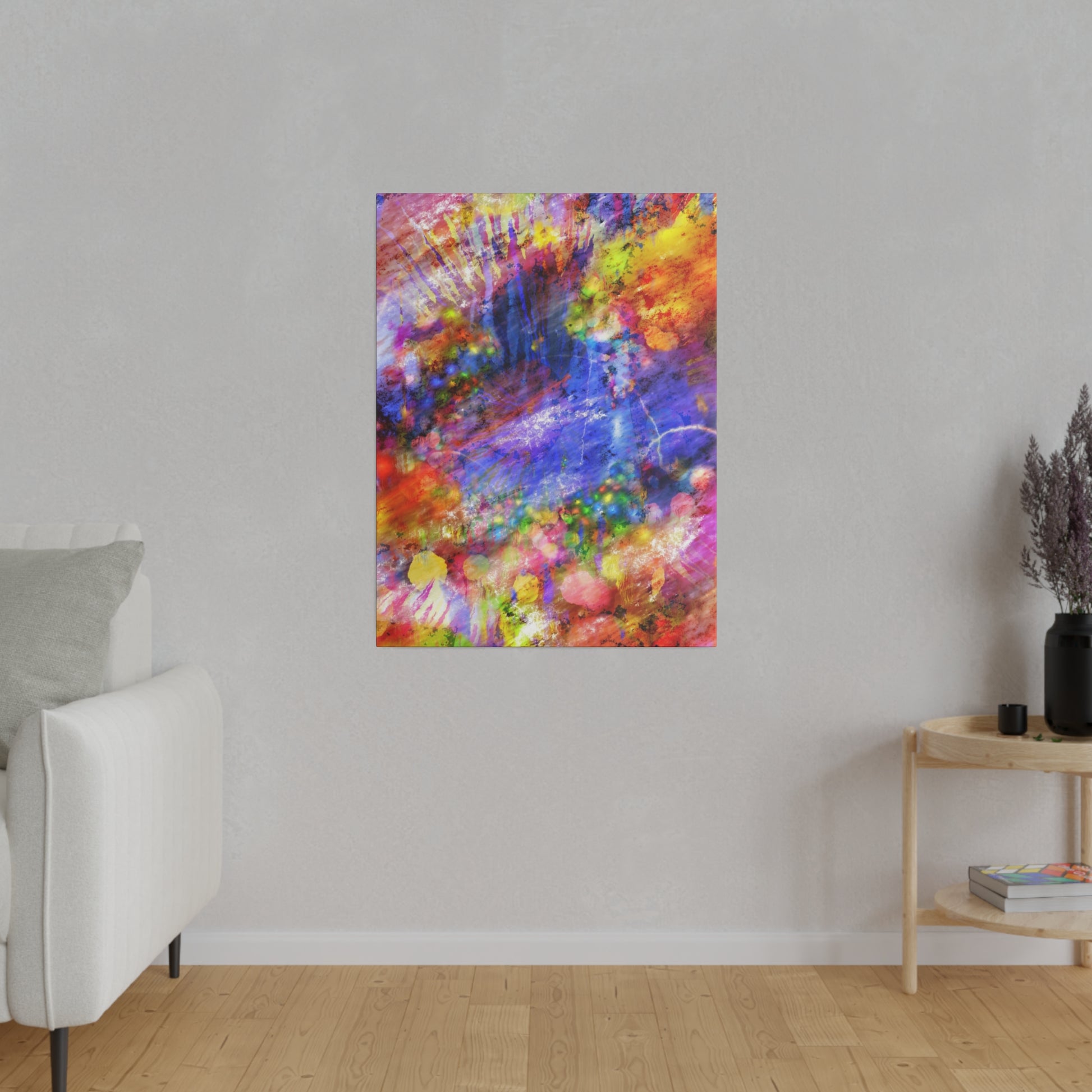 Abstract colorful painting with purple, red, yellow tones mounted on a light gray wall in a minimalist living room.