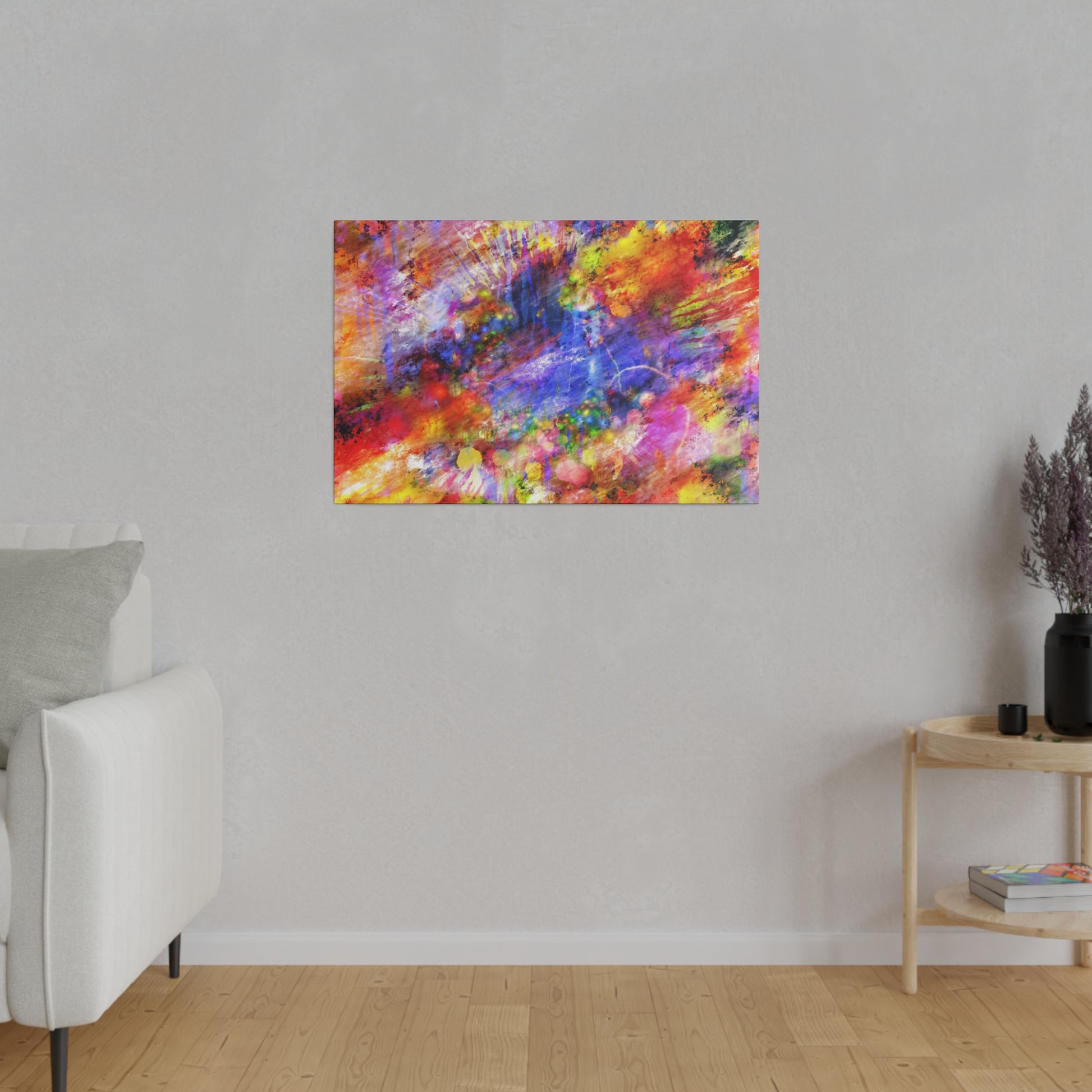 Abstract colorful painting with red, blue, yellow splashes on a gray wall in a minimalist living room.