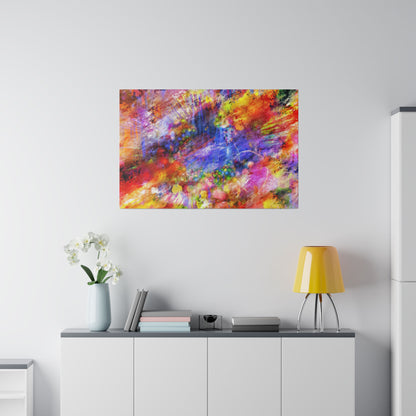 Colorful abstract painting on a white wall above a white cabinet with a yellow lamp, books, and a vase of white orchids.