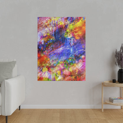 Vibrant abstract painting with splashes of red, purple, yellow, and blue hanging on a light gray wall in a modern living room.