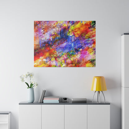 Abstract colorful painting with red, blue, and yellow splatters hangs above a white sideboard with a vase of white flowers, books, and a
