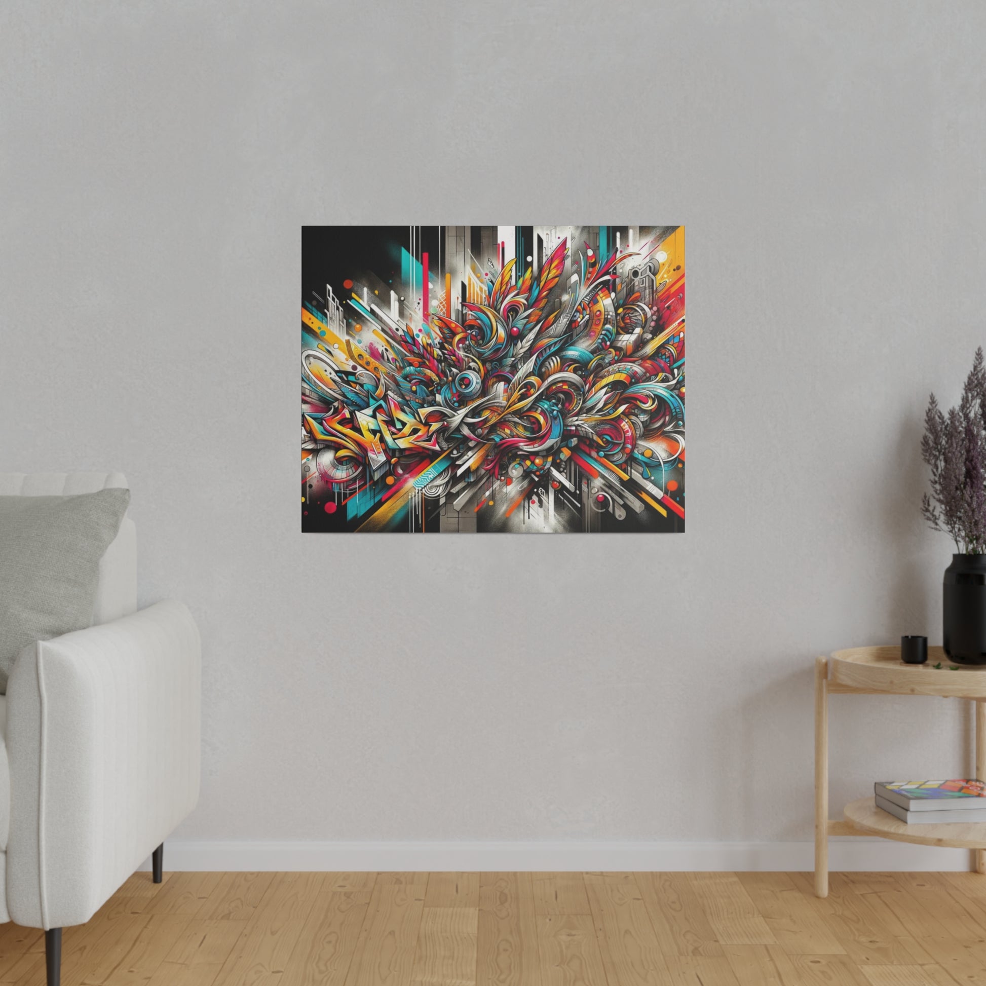 Colorful abstract graffiti-style painting mounted on a light gray wall in a minimalist living room, with a white sofa to the left and a