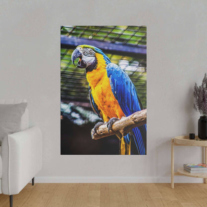 Large canvas print of a blue-and-yellow macaw perched on a branch indoors, with vivid colors.