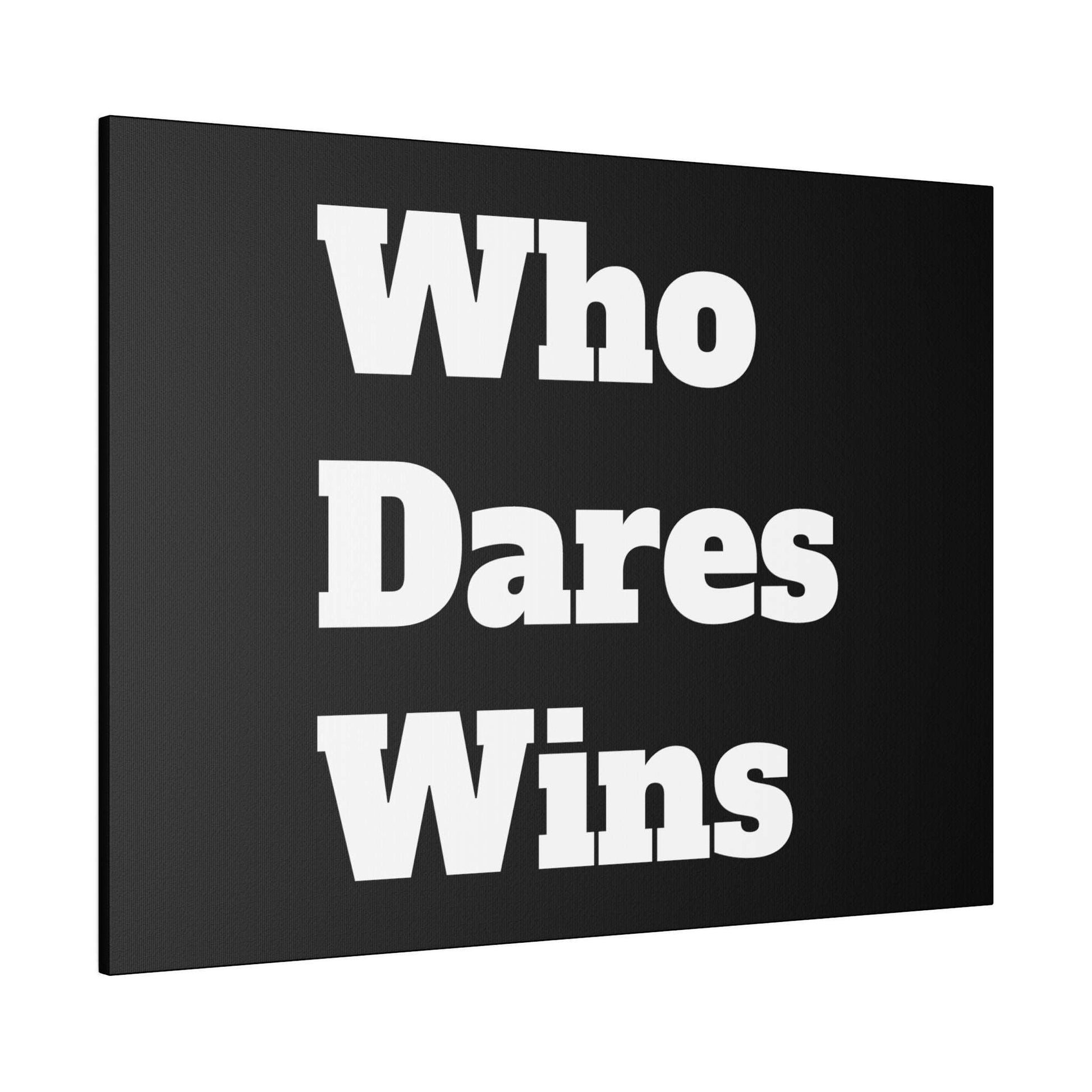 Black stretched canvas with large white bold text reading “Who Dares Wins” stacked in three lines.